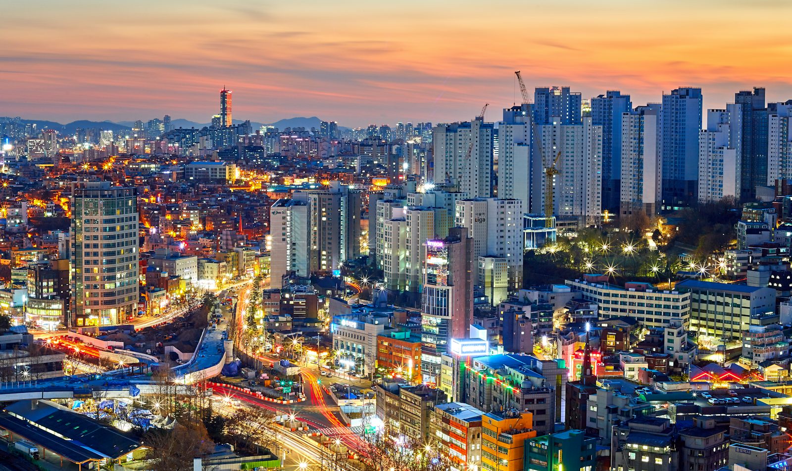 Seoul skyline and city streets at sunset